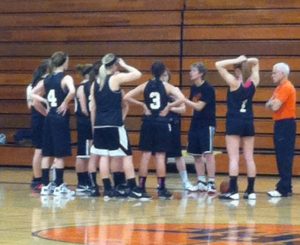 THE IMPORTANCE OF DEFENSE Coach Olson pulled the team aside in the Sam Young Gym during practice on Monday, December 16 during a scrimmage to reinforce defense.