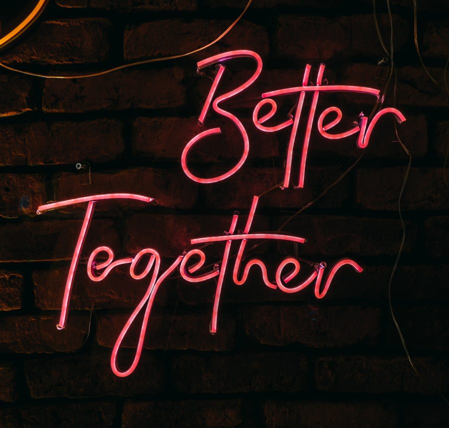 neon sign that says "better together"