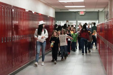Students walking down hallway